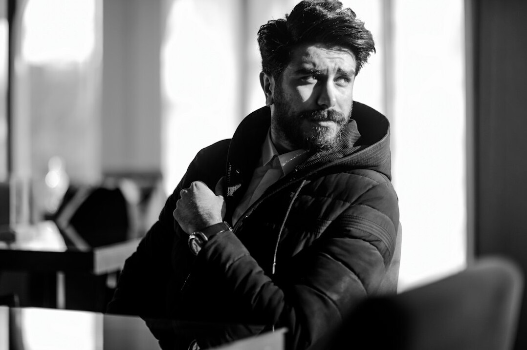 Portrait of a bearded man in a casual jacket